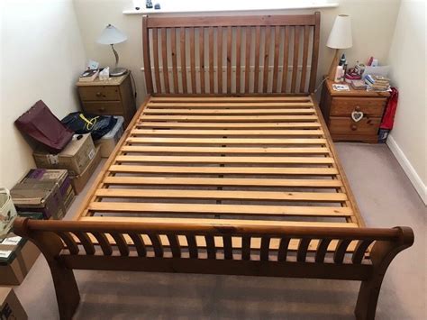 Wooden Bed Frame and Mattress. . Used king size bed frame